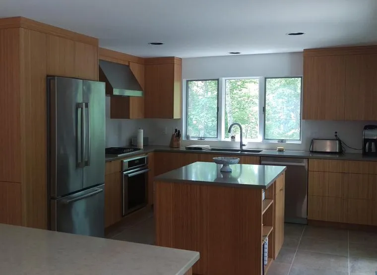 Kitchen with wood cabinetry and stainless appliances